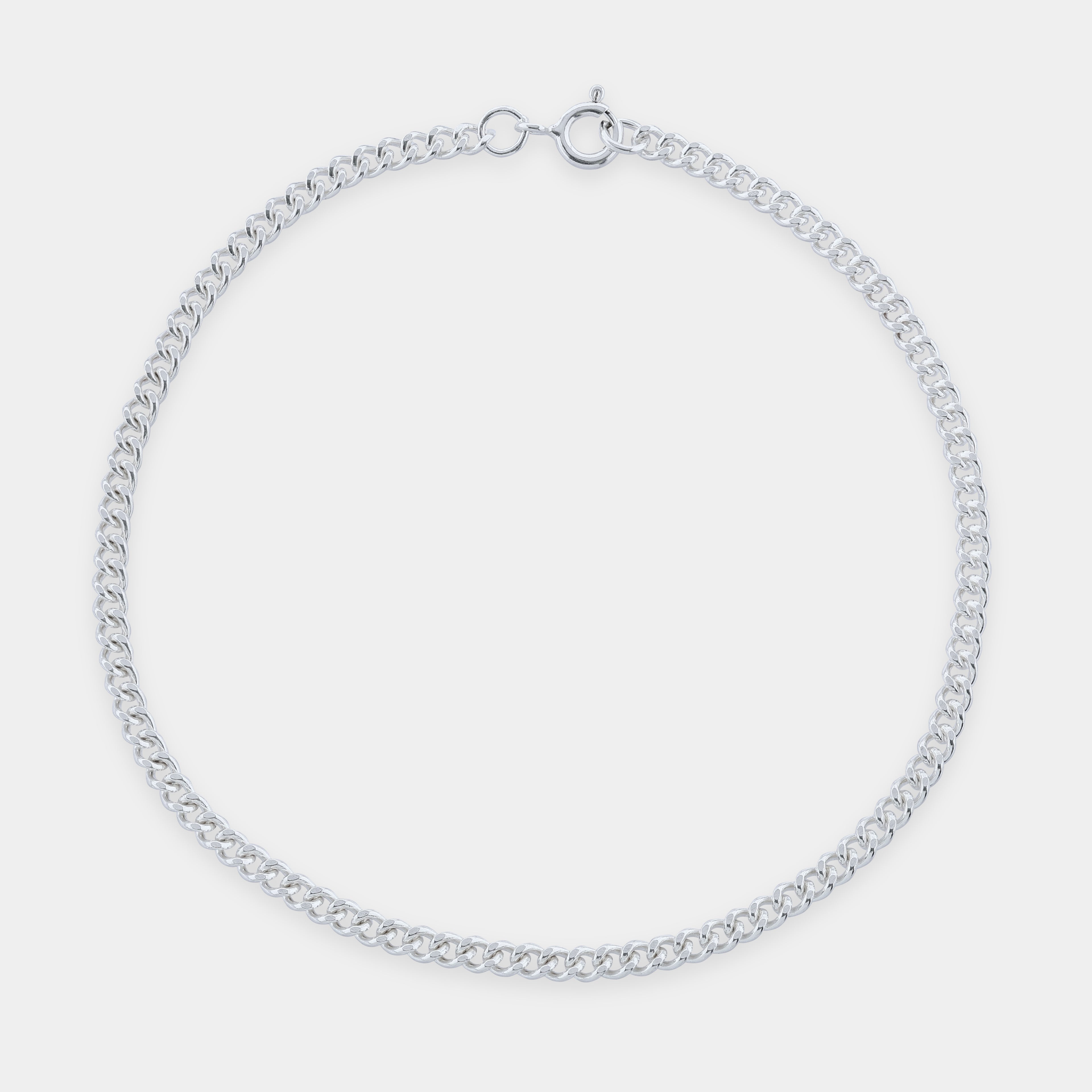 Silver Monarch Filed Curb Bracelet with a light grey background. 