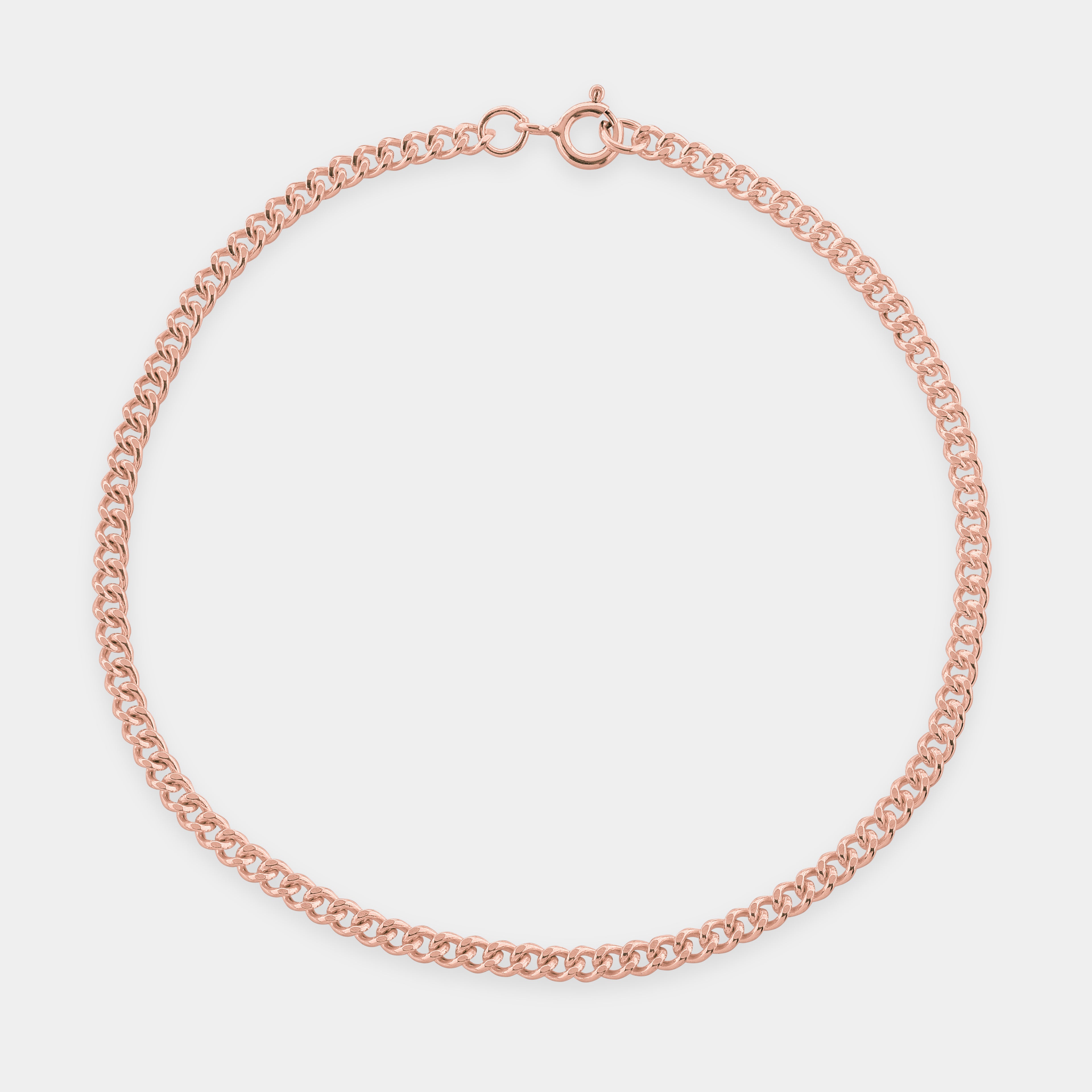 Rose Gold Monarch Filed Curb Bracelet with a light grey background. 