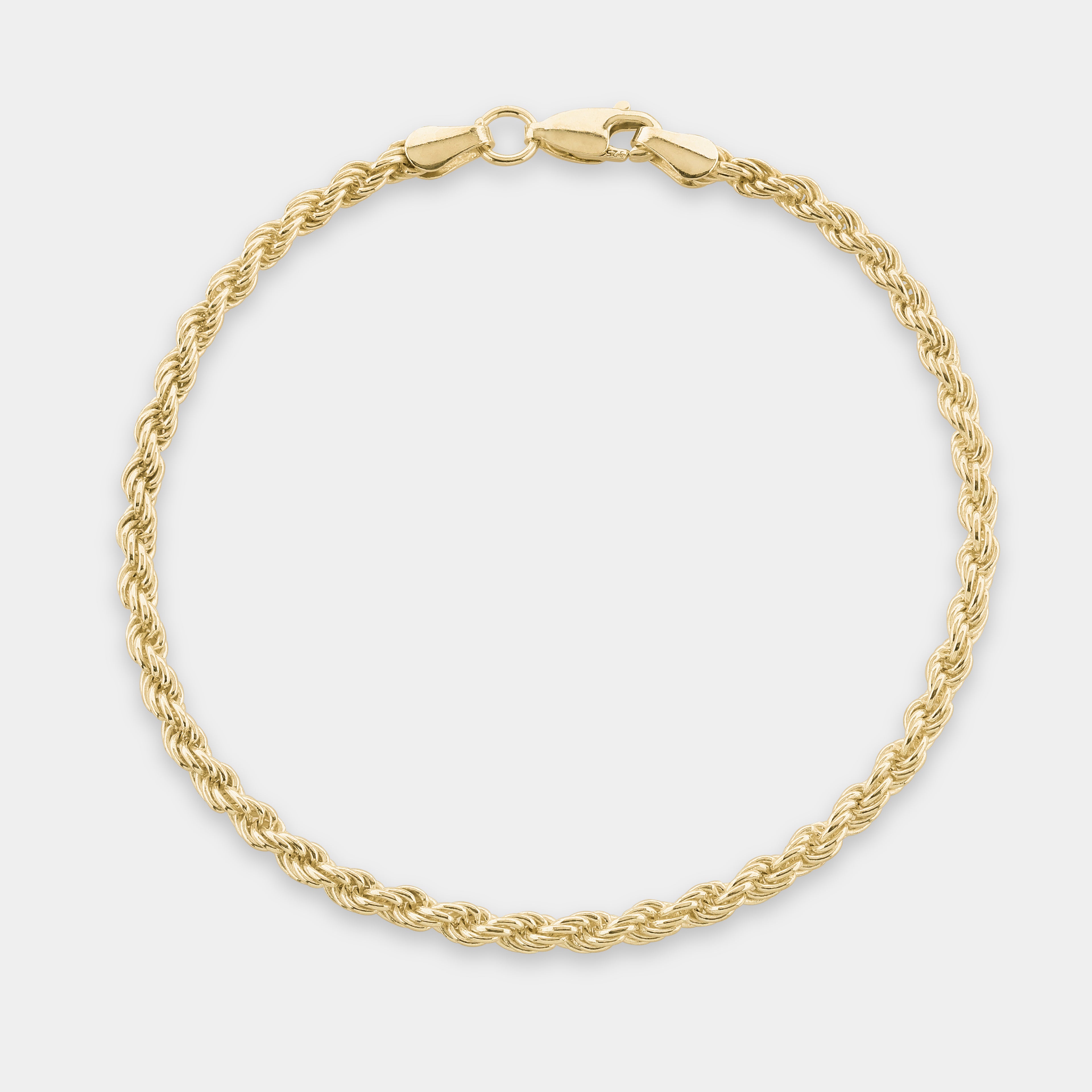 Monarch Rope Gold Bracelet On a light grey background