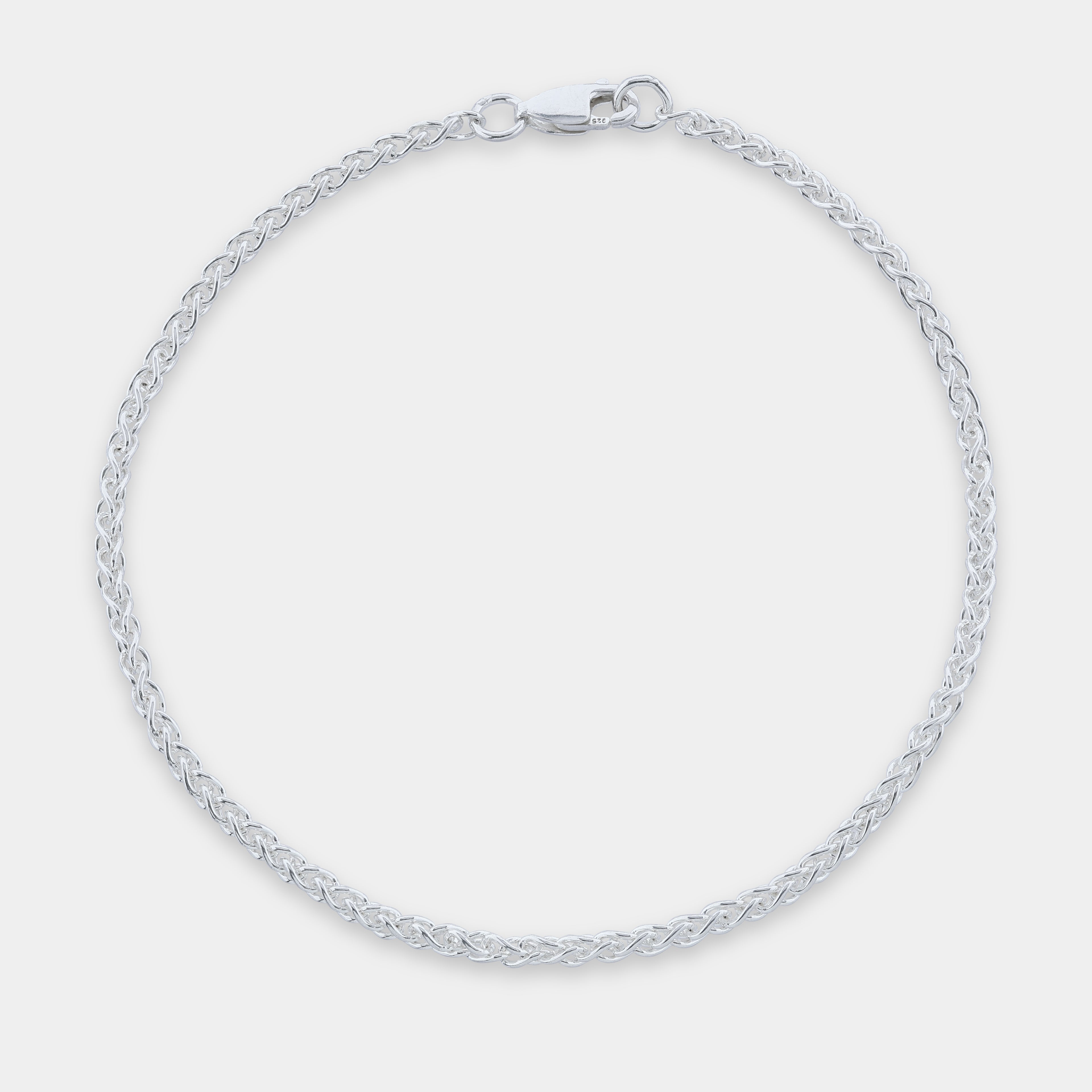 Silver Monarch Spiga bracelet on a light gray background 